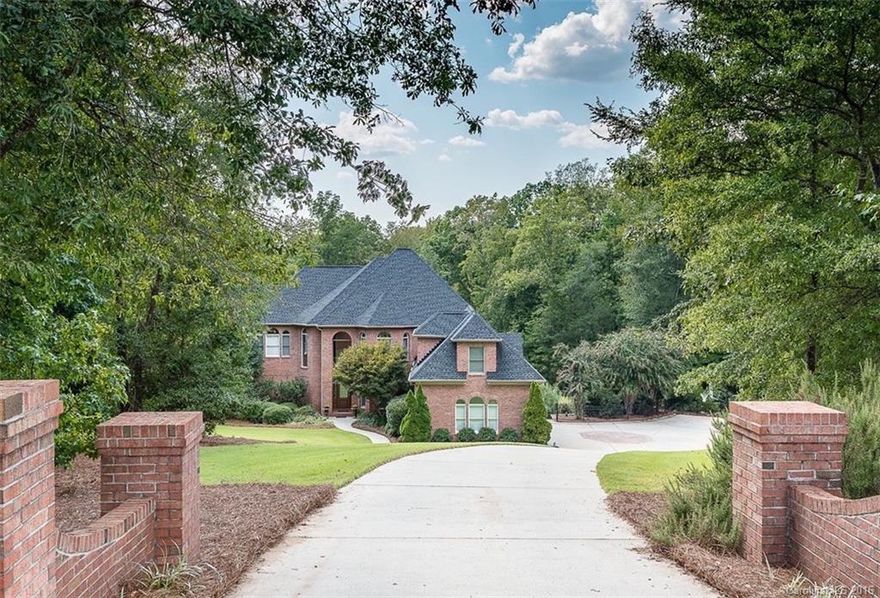 Quintessential Beauty w/all the Finer Appointments on Nearly Six Acres that backs to the woods & Catawba River! Covered Patio & Terrace surrounds Pool & Patio w/firepit! Stunning and flowing living & entertaining spaces and Master Suite on main. Gourmet Kitchen. Upper w/3 Bedrooms & versatile Bonus Rm. Lower Rec Rm, Theater Rm, Billiard & Guest living space. Screened Porch overlooking gorgeous estate! Set between upscale Ballantyne & in Fort Mill schools. Septic permit for 4 BDs, but has 6 BDs.