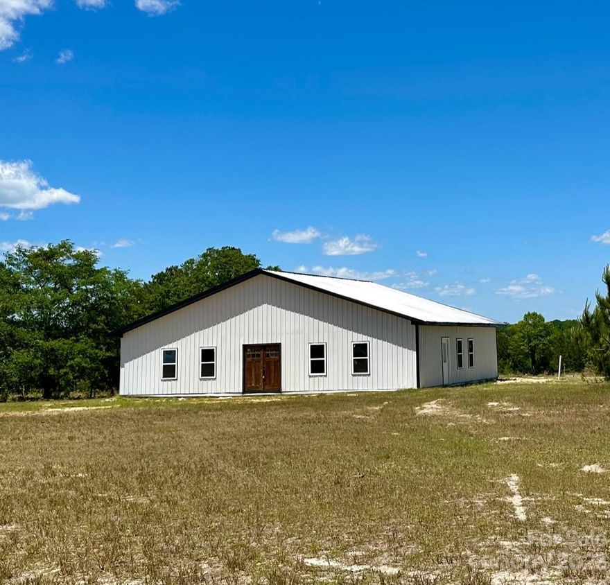 If you're ready to make the move to the country, look no further! This barndominium is situated on 3 acres of land. Currently framed for 3 bedrooms, 2 bathrooms and 1920 sq ft.  It's an awesome opportunity to complete all the finishing touches with your own style! Current owners have completed windows, roof, and most of the framing-tubs, shower, toilets, and one bathroom vanity included-new owners will get to finish the home themselves.  Already has water tap and septic in place. This is a cash only sale due to the home being sold as-is.
