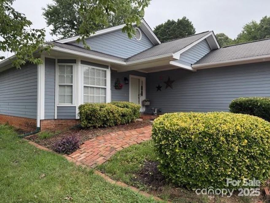 Discover this bungalow-style detached condo with a private garage in the sought-after Regent Park. Offering 3 bedrooms and 2 baths, it lives like a single-family home with the ease of condo care. The bright, open floor plan welcomes you with a spacious kitchen and dining area flowing into a finished sunroom that doubles as a cozy den or office. Enjoy evenings on your private patio deck, perfect for relaxing or entertaining. The inviting primary suite is joined by two guest bedrooms and a full bath, creating a comfortable space for everyone. With hardboard siding and a quiet cul-de-sac setting, this home delivers charm and convenience in equal measure. All just minutes from shopping, dining, Carowinds, Cabela’s, and quick access to I-77. The best of Fort Mill living is right at your doorstep.