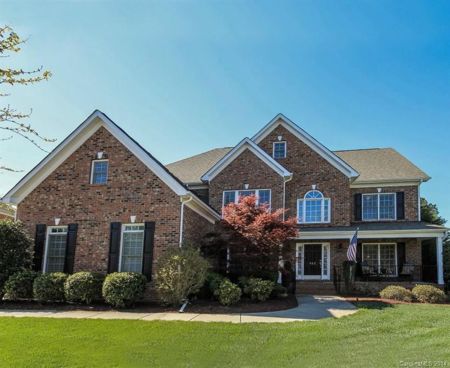 Executive All Brick Home located in SC, but minutes from uptown Charlotte.  This home has an open floor plan with formal and casual living spaces.  Great room with Gas Log fireplace.  Oversized screen porch and deck with sunsetter awning for taking in the beautiful outdoor views.  Office/5th bedroom located on main floor with full bath.  Master bedroom and other 3 bedrooms upstairs as well as bonus room.  This home features plantation shutters through out.  Unfinished walk up attic pre-plumbed!