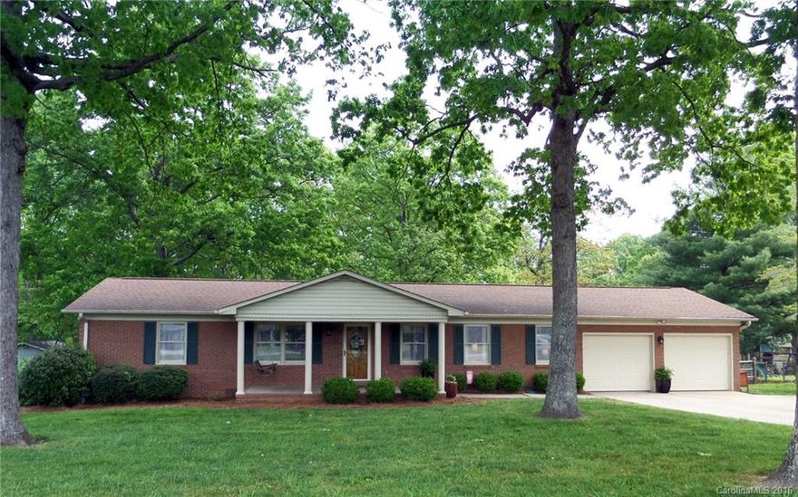 ALL BRICK RANCH - Ready to move-in! This meticulously maintained and updated home is the perfect starter or downsizer. Updates include an open floor plan, new floors throughout, and newer roof and stainless appliances. Floor plan features a large eat-in kitchen, den or office off the family room, bedrooms with walk-in closets, private master with large en suite bath. Home is situated in a park-like setting, fully fenced with mature trees, level lot, and huge deck to enjoy it from.