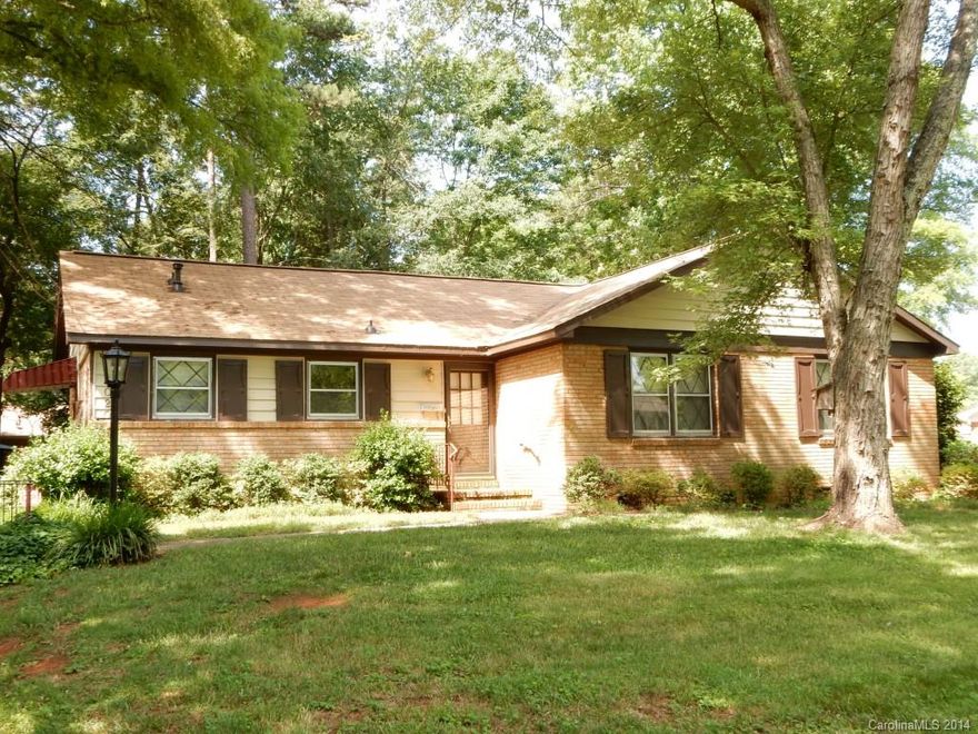 This is an older home w/mature landscaping that has been cared for with many updates, including carpet, painting & fixtures.  Modern appliances in kitchen w/wood cabinetry; includes wood burning fireplace w/stonework in den/family area.  Fantastic, private yard which includes storage shed and double chair swing.  Close to schools, shopping and major thoroughfares.  This home is a must see!