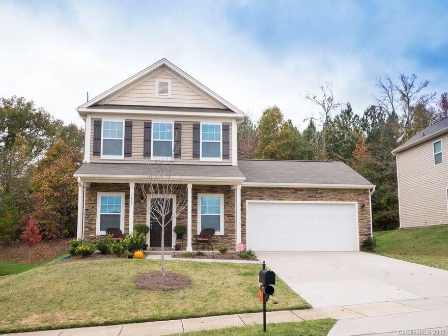 This gorgeous 2 year old home in the Holly Hills community will impress with all the attention to detail. Gorgeous dark hardwood floors greet you in the foyer and extend through the study, and kitchen dining area. Gorgeous granite counters in the kitchen, were also added in all three baths. Also features stainless appliances, crown molding, upgraded light fixtures, large kitchen island and private fenced backyard!