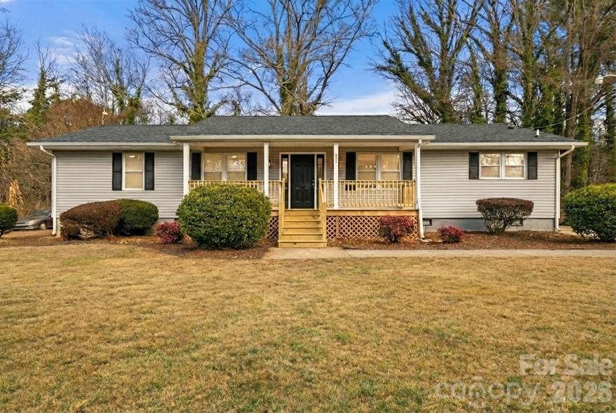 This thoughtfully renovated 3-bedroom, 2 full bathroom home offers modern updates, flexible living, and a convenient location. Situated on a quiet street just minutes from downtown Statesville, the property provides easy access to Lake Norman, Mooresville, Charlotte, Mocksville, Winston-Salem, and major corridors including I-40 and I-77.

Inside, nearly every detail has been updated with the new buyer in mind. Enjoy brand-new carpet and LVP flooring as well as fresh paint and trim throughout, in addition to doors, windows and hardware. Look forward to many days cooking in the new functional kitchen space that is equipped with all new appliances, counter tops, and cabinetry. The main area has been expanded for ample living space or to serve a dual purpose function. With a separate area for a designated dining area or additional sitting space, the home provides square footage and openness for gathering. The primary bathroom boast an attached full bathroom, a large walk in closet, and a generous additional closet for storage.  Both bathrooms feature new vanities, and the home has undergone electrical / plumbing updates as well as a roof replacement in 2020, offering peace of mind and true move-in-ready convenience. 

Relax on the rebuilt front porch, or take advantage of the front and back yards, which are ready for your personal gardening touches, outdoor entertaining ideas, or future fencing. Enjoy access to the large detached shed in the back yard with plenty of storage for your outdoor necessities. A large detached carport and expansive driveway provide ample parking and everyday practicality.

This property is an excellent fit for first-time homebuyers, a growing family, or those looking to downsize to convenient one-level living. It also presents a strong opportunity for investors, with estimated rental income around $2,000 per month in a high-demand area.

Fully remodeled, ideally located, and full of potential—this Statesville home delivers on features, function, and versatility.