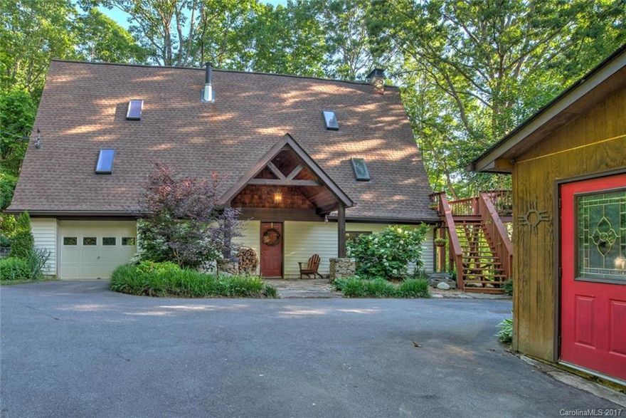 Cozy Mountain Cabin Nestled In The Woods In A Wonderful Private Setting w/Over 2 Acres. This Beautiful Home   Is Filled With Character and Charm & Uniquely Laid Out. Featuring Sweeping Winter Mountain Views, 3 Bedrooms-Master on Main, 2 Baths w/Updated Custom Tiled Showers, Cozy Wood Burning Fireplace,Gorgeous Hardwood Flooring, Precious Kitchen w/Lots of Cabinet Space, Large Great Room, Lovely Sun Room, Big Back Deck & An Awesome Workshop w/Separate Electrical Box- Could Be Used For A Business