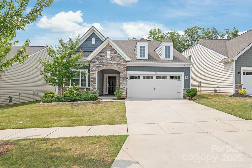 Welcome to this stunning 1.5-story, 3-bedroom, 3-bath smart home in the sought-after Chateau community! Enjoy luxury living with a gourmet kitchen, upgraded fixtures, and abundant natural light. The grand foyer opens to a formal dining area and a spacious open floor plan. The kitchen boasts a center island, granite countertops, stainless appliances, tile backsplash, pendant lighting, and a walk-in pantry. The living room features a gas log fireplace and connects to a bright breakfast area. The main-level primary suite offers a tiled shower, dual vanity, and huge walk-in closet. A second bedroom, full bath, and laundry room complete the first floor. Upstairs includes a spacious bedroom, full bath, and bonus room with generous storage. Relax in the fenced backyard oasis with a covered patio, built-in gas grill, and extended pavers. HOA-maintained lawn. Community amenities include a pool, clubhouse, fitness center & more!