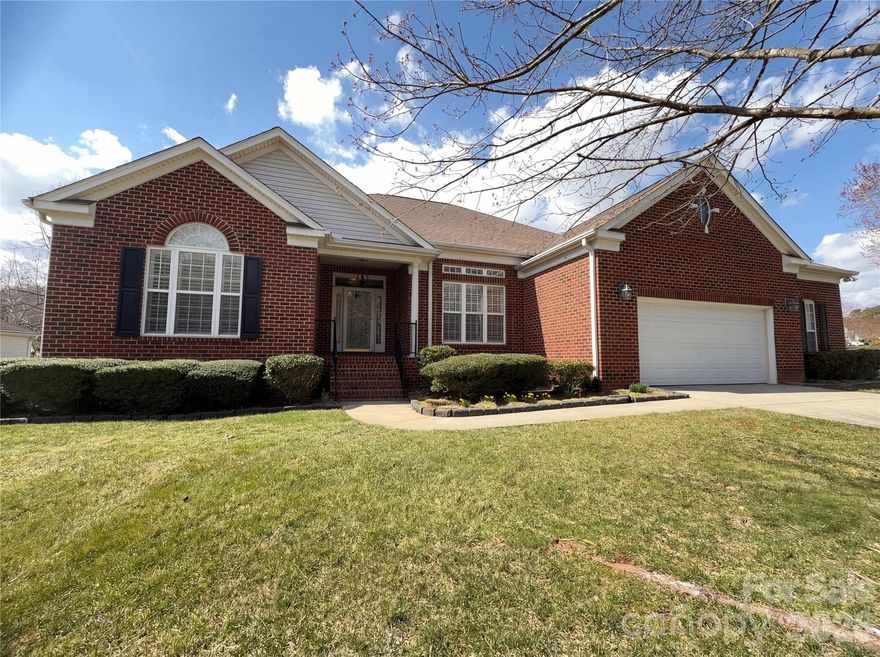 Welcome to this beautiful ranch-style brick faced home offering the perfect blend of comfort, space, and functionality. The thoughtfully designed open floorplan features tall ceilings, large windows, and spacious rooms that create a bright and inviting atmosphere throughout. The living areas flow seamlessly, making the home ideal for both everyday living and entertaining.

Enjoy relaxing in the cozy sunroom complete with a fireplace, the perfect spot to unwind year-round. A dedicated office provides a great space for working from home or creating a quiet retreat. The home also offers excellent storage and a large garage to accommodate all your needs.

Step outside to the expansive back deck overlooking the property—perfect for outdoor gatherings or peaceful evenings. Located in the charming town of Stanley, this home combines small-town charm with convenient access to nearby areas while offering a quiet, welcoming community.