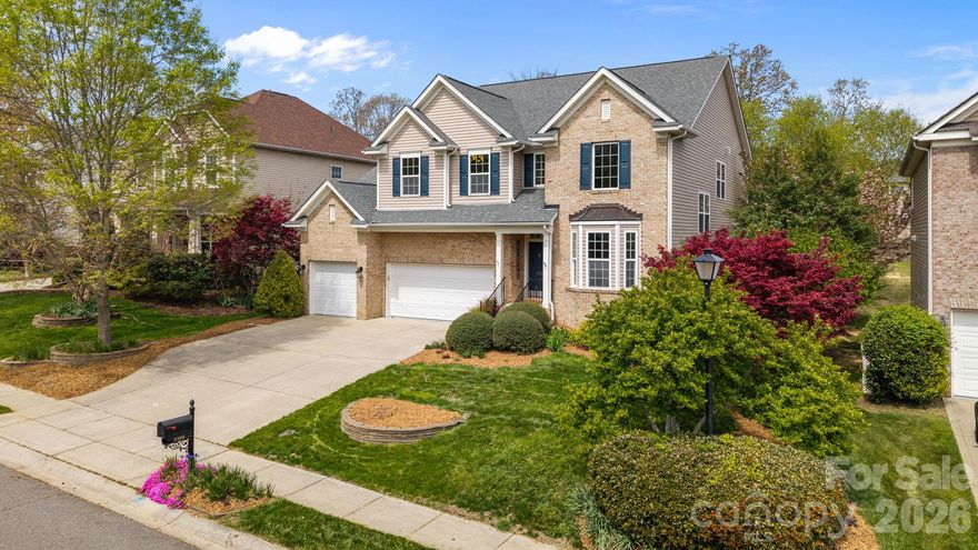 This five bedroom home in Providence Grove is move-in ready and the best value in the community with fresh paint, new carpet, and newly refinished hardwood floors. The main level includes the coveted guest suite, living room and great room with gas logs fireplace, sunroom and kitchen. The beautiful kitchen has been updated with a new backsplash and newer appliances (microwave and range/oven (2023), dishwasher (2024), solid surface countertops and an extra large pantry. A built in office is off the kitchen offers privacy. The sunroom is a great year round space that gets plenty of natural light and leads out to the deck with the beautifully landscaped backyard and fire pit. Upstairs, the large primary bedroom has a tray ceiling and the primary bathroom with two vanities. Three more bedrooms with a hall bath and a bonus room offers flexibility - workout room, media room, office, etc. The three-car garage provides ample space for vehicles and storage and features epoxy floors. Located in Marvin in the highly regarded Marvin Ridge school district, the home has easy access to shopping, dining and Charlotte! Roof (2018), gas water heater (2023), upstairs HVAC (2024). Three new windows: one in foyer, one in upstairs hall bath, and one in primary bathroom. Ripple Fiber available. Community amenities include a pool, walking trails, playground and clubhouse. Come see your new home today!