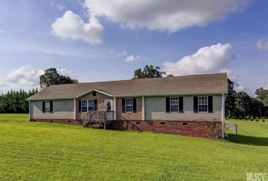 Oh my goodness!  It's big, it's bright, it's clean & it's ready for a new family.  High ceilings, fresh neutral colors, extra-large kitchen, split bedroom plan, expansive master bedroom & bath, oversized deck, level fenced-in yard for family & pet safety  & a wonderful outbuilding for storage.  Located only minutes from groceries & restaurants yet with easy access to Hwys 127 & 16 for access to Hickory and Charlotte.