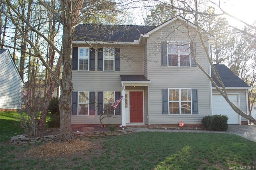 Beautifully maintained home with covered entryway and 1 car garage. This home features "hand scraped" wide plank bamboo wood floors, ceramic tile, updated fixtures, faux wood blinds, and refinished oak stairs.  Large master bedroom with vaulted ceiling and plantation blinds. Outdoors features a fenced in back yard with expansive patio area. Impressive landscaping includes gardenias, clematis, tulip trees, magnolia trees, and a Japanese maple. New roof and gutters in 2015. HVAC replaced in 2012.