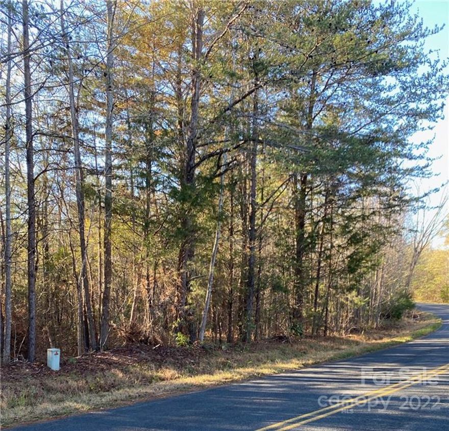 Here’s your chance to own a piece of Clover history. This property has been passed down through a local family for generations. Bring your builder and create your perfect country retreat on this beautiful, private, wooded lot.  Located minutes from Historic Downtown Clover, and a short drive to Lake Wylie and York!