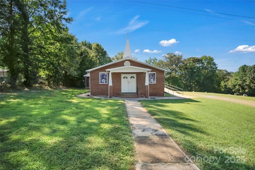 Move-in-ready church property with great potential! This brick church property features a welcoming sanctuary complete with 26 pews, ideal for congregational gatherings. The layout includes a baptism pool, two private offices, four half bathrooms, a spacious kitchen & dining area perfect for fellowship or community events. Thoughtful details such as a water fountain, handicap ramp, and ample parking on the side and rear of the building enhance convenience and accessibility. The interior is clean, inviting, and ready for worship or other community uses. Cemetery not included in sale.