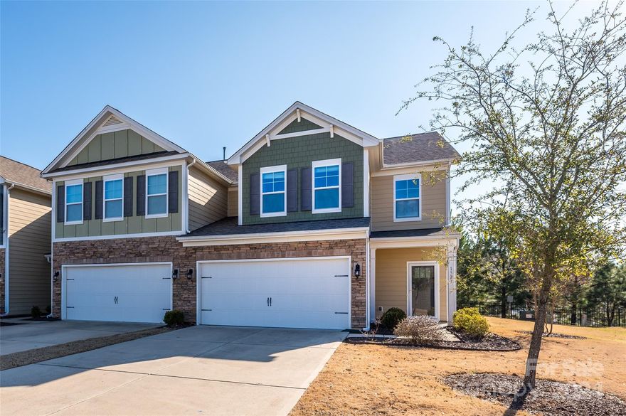 Beautiful End-Unit Townhome in highly desired Forest Grove Subdivision!. As you enter in to this highly upgraded, open floor plan Townhome with 2-story foyer, you will be amazed seeing the gleaming hardwood floors through-out main level and sunlight from so many extra windows on the side as this is a end unit. Main level has kitchen w/island, beautiful coffee color cabinets, granite countertops, SS appliances, Gas range w/Oven, spacious dining area, breakfast area, family room, laundry, stairs w/Iron railings, Primary bed room with deluxe bath and large closet. Upper level boasts of an oversized loft, three spacious bed rooms and a full bath. Home is freshly painted. 2-car attached garage with Epoxy coated flooring and extra storage racks fixed to the ceiling. Amenities include Pool, Playground and a recreation area. Top rated schools.