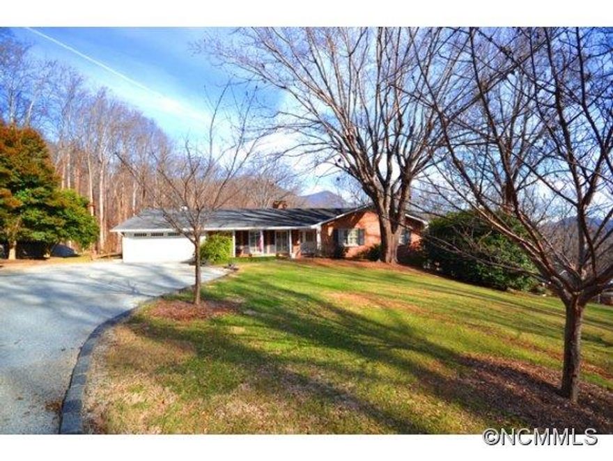 All brick 4 bed, 3 bath home with sloping 1.6 acres in an est. quiet neighborhood. 2 car garage, covered deck on main and open deck on lower lvl. Wnt mtn view! Big lr, formal dr, 3 beds on main and apt in lower lvl w/kitchen. TONS of storage, this is a collector's or hobbyists dream home with many "flex" rooms including built-in display cabinets. Custom 16'x20' workshop with two levels, perfect for 2 home offices. Must see!