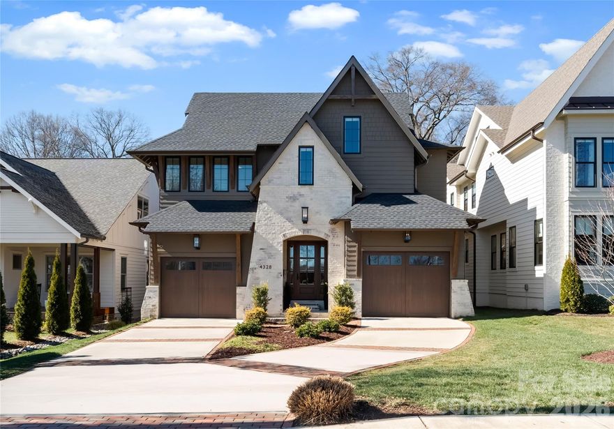 Welcome to 4328 Walker Road, an exceptional custom residence built in 2022 by Roma Homes, offering 4,403 square feet of thoughtfully curated living in the heart of Cotswold. Designed with intention and architectural clarity, this six-bedroom, four-and-a-half-bath home seamlessly balances scale and livability. A main-level primary suite anchors the home, while expansive open living spaces are defined by vaulted ceilings, abundant natural light, and a gas fireplace in the great room. Multiple flex spaces including a media room, private office, reading room offer versatility to suit a range of lifestyle needs, with the opportunity to create a seventh bedroom in current room with ensuite bath upstairs, if desired.

The kitchen reflects both craftsmanship and performance, featuring custom handcrafted oak cabinetry, an oversized island, walk-in pantry, and a premium JennAir appliance suite with integrated refrigeration, equally suited for everyday living and elevated entertaining.

Outdoor living unfolds naturally from the interior, with a covered screened porch featuring a wood-burning fireplace, an elevated deck, and a fully fenced yard that provides privacy and year-round enjoyment, with exceptional potential to create a bespoke outdoor oasis.

Extensive owner enhancements further distinguish the home, including a custom-built office, integrated wine refrigeration and refrigerated drawers, premium Stark carpeting, custom shutters, a whole-home water filtration system, tankless water heater, and the addition of a full upstairs bath. A fully equipped media room with motorized blackout shades, Optoma projector, 100-inch screen, and surround sound offers an immersive viewing experience. The home is also pre-wired for AT&T Fiber and ADT security.

Ideally located just moments from Cotswold Village, SouthPark, Uptown, and Charlotte’s premier private country clubs, this residence represents a rare opportunity to own a thoughtfully designed, highly upgraded home in one of the city’s most enduring and desirable neighborhoods.