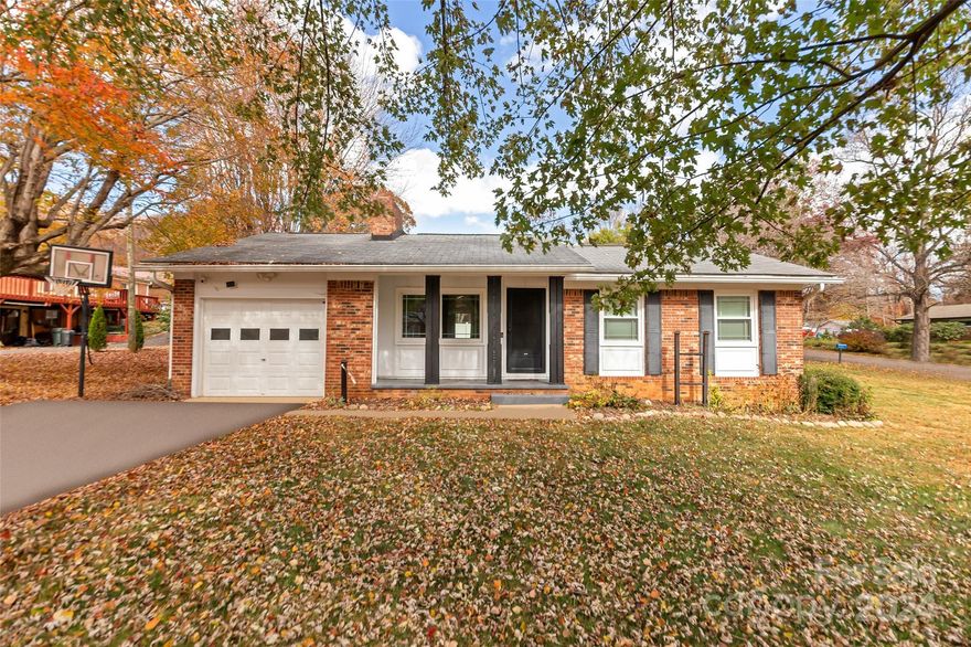 Move-in ready home in the heart of the Grovemont community in Swannanoa.  Just steps to the community park and playground, this sweet brick rancher sits on a nearly level yard with huge mountain views. Enjoy one level living with 3 bedrooms and 2 bathrooms and laundry on the main floor.  Cozy up in front of your living room fireplace while you take in the big mountain views just out your front window.  If you need storage, this home has an extra storage shed and 1 car garage.  Just minutes to Asheville and Black Mountain.  This community is a special place in the mountains!