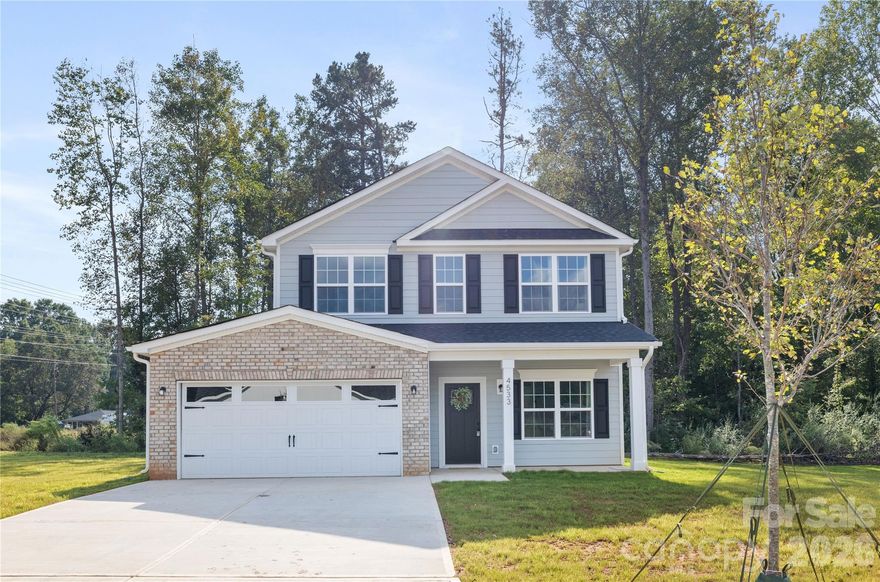 This stunning new-construction residence on Dawn Circle delivers modern style and everyday comfort in a well-connected Charlotte location. The thoughtfully designed two-story layout offers 4 bedrooms, 2.5 bathrooms, and a dedicated office space ideal for remote work, study, or a quiet flex area. A bright, open main living area flows seamlessly into the gourmet kitchen with stainless steel appliances, sleek cabinetry, and expansive countertops, making it perfect for  both daily living and entertaining. Upstairs, the spacious primary suite provides a private retreat with a wilk-in closet and well-appointed bath, while three additional bedrooms offer flexibility for guests or family. A private backyard completes the home, and convenient access to I-85, I-77, and I-485 makes it easy to reach Uptown Charlotte, University area, and major shopping and dining destinations. Photos are representative of a previous build and may not reflect current finishes or final construction.