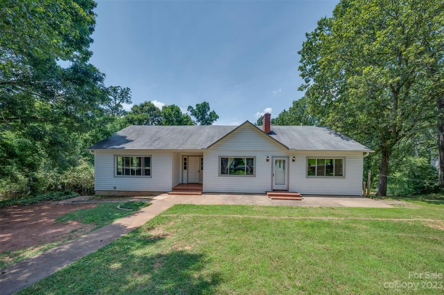 Great opportunity! With a little TLC, this would be a beautiful property. Located in the heart of Spindale, you will have quick access to all daily necessities - shopping, grocery stores, restaurants, etc. This home sits on 1.13 acres and has 2 bedrooms, 1 full bath and a full unfinished basement. The yard offers plenty of space for entertaining, pets, and gardening. Seller is motivated to sell!