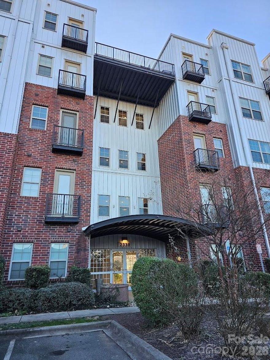 Welcome to an exceptional opportunity to own in Charlotte’s vibrant urban core — this contemporary 2-bed, 2-bath condo with 972 sq. ft. of modern living space blends stylish design with unbeatable location and lifestyle. Nestled in the Villa Heights/NoDa area, just steps from colorful arts, craft breweries, dining, and dynamic walkable neighborhoods, this unit is perfect for professionals relocating to Charlotte’s booming financial services & tech hub — especially buyers from Chicago, New York & California seeking value, culture, and growth.
This end unit boasts industrial-modern appeal with tall ceilings, exposed beams, and a private balcony — perfect for relaxing or entertaining. The updated kitchen features granite countertops, sleek black cabinetry, tile backsplash, and stainless appliances for contemporary comfort and style. A generous primary suite includes a walk-in closet and en-suite bath, while the open floor plan encourages seamless daily living.
Located half a mile from the heart of NoDa (North Davidson) — one of Charlotte’s most sought-after neighborhoods — you’ll enjoy walkable access to cafes, galleries, breweries, shops, and nightlife, with quick connections to Uptown Charlotte’s financial district, major employers, and transit options. With low-maintenance living and exceptional lifestyle amenities, this condo is ideal for first-time buyers, investors, or urban executives relocating for career growth.
Don’t miss this chance to live or invest in one of Charlotte’s most dynamic markets — perfect for those relocating from Chicago, New York, or California drawn to Charlotte’s affordable home prices, rising job market, and vibrant cultural scene. Schedule a tour today and discover urban living at its best in one of the Southeast’s fastest-growing cities!