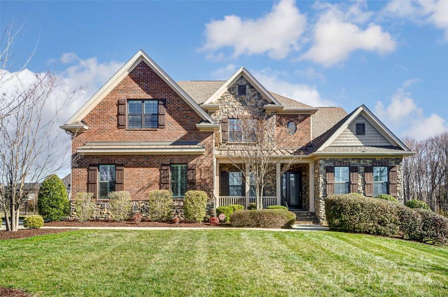 GORGEOUS turn key property in sought after Marvin Ridge School district! Premium .68 Acre lot in soon to be GATED Marvin community. Wide open 5,000+ sq ft, 6 Bed, 5.5 Bath + Bonus floor plan w/Huge Primary Suite & 2 offices on Main. Beautiful details w/large kitchen, granite counters, walk-in pantry, hardwoods throughout the entire main floor, over-sized family room w/gas fireplace, sunroom & INCREDIBLE Primary Suite w/wet bar & separate private sitting room/2nd office. Extras Include: All NEW paint throughout, upgraded new lighting, Plantation shutters, drop zone w/built in lockers, granite counters in all bathrooms, tankless water heater, 2 Laundry rooms (Up & Down), home wired for surround sound, butlers pantry, All brick home w/custom stone accents, 3 car garage, 6 zone irrigation system, new outdoor lighting, gas line to for outdoor grill, rear deck overlooking large flat backyard ideal for outdoor entertaining.  BEAUTIFUL PROPERTY IN IMMACULATE CONDITION! IDEAL LOCATION! HURRY!