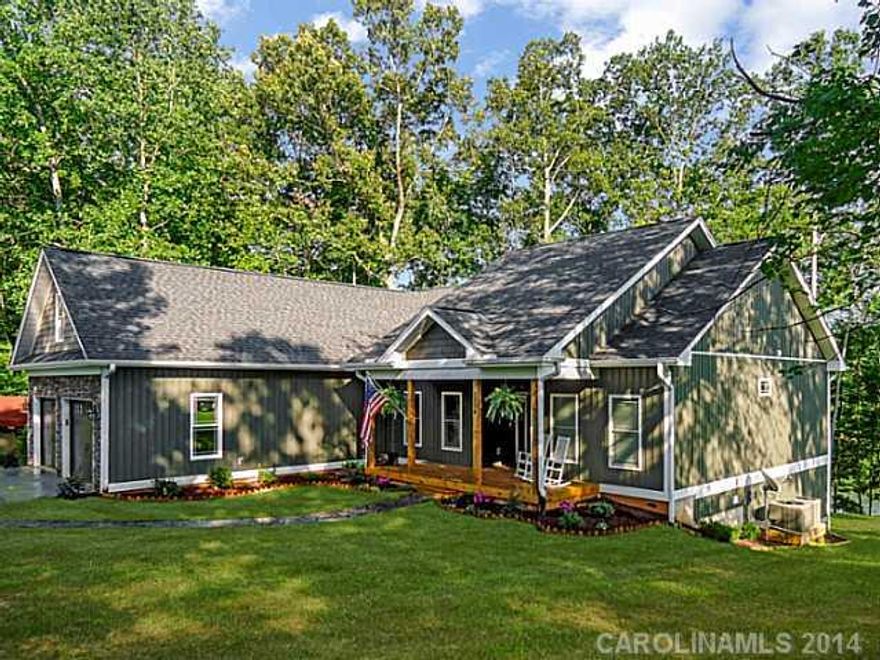 Your Lake Retreat Awaits! Experience the joy of lake living to the fullest from this 1 story basement gem tucked away under the shade trees, surrounded by wildlife with a rural feel yet only 10 minutes from amenities. Enjoy sunrises from the back deck & sunsets from the front porch. Inside this lovely home the craftsmanship is endless with gourmet kitchen, lower level wet bar & so much more! Hurry