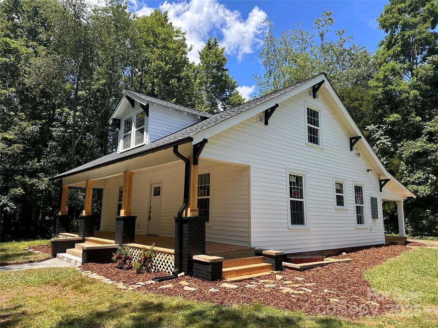 Welcome to this beautifully restored 3-bedroom, 2-bath home located in the Whitnel area of Lenoir. This 1922 Farmhouse was brought back to life with a full renovation blending historic character with modern updates. Step onto the wide covered front porch and into a bright living space with fresh paint, new flooring, and new windows throughout. The kitchen has been fully updated with new cabinetry, counters, and appliances. Both bathrooms feature new vanities and fixtures, with the primary bathroom shower having stylish tile. Also brand new includes the roof, electrical, plumbing, and HVAC systems, asphalt driveway, front and rear porches, and partially updated foundation - giving the charm of a classic home with the peace of mind of modern systems. Enjoy the large, shaded lot and detached open garage for hobbies and relaxing. Close to Downtown Lenoir, schools, dining, and Hwy 321 for easy access to Hickory or Boone. This one is a rare blend of timeless appeal and turnkey convenience!