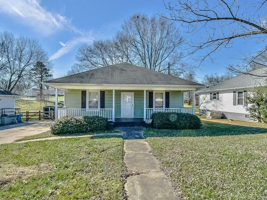 Charming Ranch Home with a Front Porch & Fenced Level Yard. Lovely layout with large Kitchen and full Laundry Room. Hardwoods. Updated fixtures. Updated Baths. Set among nice neighborhood with mature trees. Wonderful location near I-85, I-485 and beautiful downtown Belmont restaurants and shopping.
