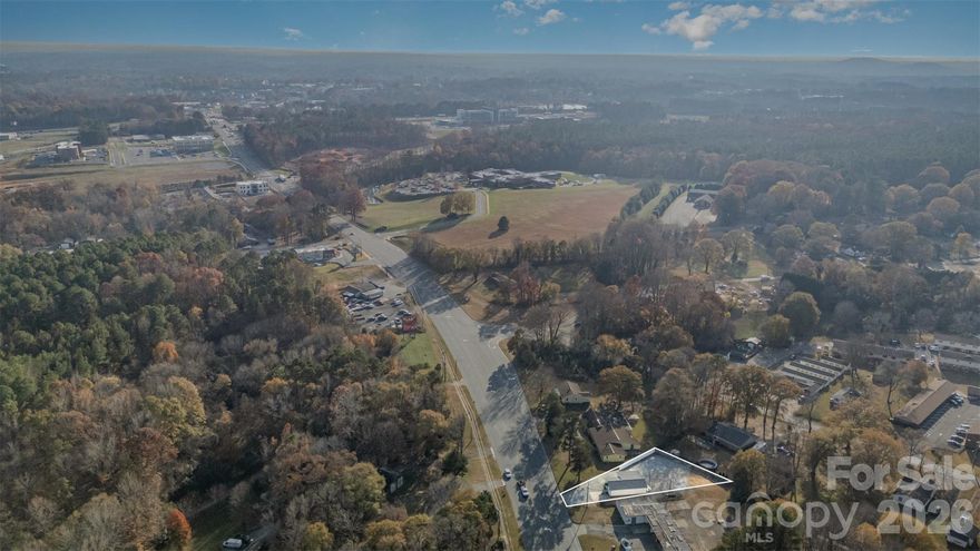 We are presenting a prime medical office development site on high-traffic Beatty Drive in Belmont, North Carolina, located just steps from CaroMont Regional Medical Center. Belmont is currently experiencing explosive growth as a key suburb of Charlotte, one of the fastest-growing markets in the United States, creating significant demand for accessible medical services. 

Beatty Drive serves as Belmont's busiest commercial corridor, ensuring your development will benefit from maximum visibility. With the hospital as your immediate neighbor, this site is perfectly primed for a medical office building, specialist suites, or a diagnostic imaging center. 

This property is adjacent to two properties currently for sale, also zoned specifically for medical office use. This gives the developer the capacity to develop a facility up to twenty-five thousand square feet, combining the three listings, which must be purchased separately. There is currently a structure on the land that has all utilities connected. This is your chance to control prime infill real estate in a location where high-quality tenants actively seek space. Call today for more information!