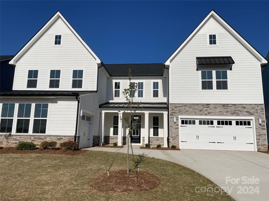 BACK ON THE MARKET!!! Beautiful new construction neighborhood and great location near Ballantyne. DESIGN UPGRADES ARE INCLUDED IN PRICE. Lovely 2story foyer welcomes you as you enter the spacious great room with gas fireplace, perfect for entertaining. Enjoy the outdoors from your covered patio and fully sodded yard. The kitchen is a chef's delight with a gas cooktop, a hood vented to the outside, built in microwave/oven plus a large walk in pantry. Lovely primary bedroom with spa like bathroom with separate shower, free standing tub and 2 walk in closets. Beautiful open staircase with wood treads leads to 2nd floor loft. Jack and Jill Bedroom/Bathroom. Perfect for multi-generational families with 1st floor guest suite, a walk in closet, private bath with a tiled shower. Make this stunning home yours today!