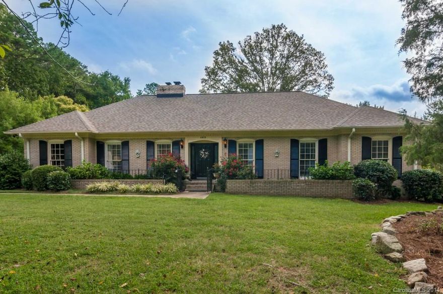 Hard to find all brick, ranch on enormous lot in S.CLT< 400k! Hardwoods throughout! Tile in baths, 9ft ceilings, granite countertops, 2 brick fireplaces, newer roof, storage closet. Versatile carport-sellers use for entering-must see! Electricity in workshop shed, manicured landscaping & Myers Park High School District!! Heated sunroom provides great place for a playroom, rec room(current use), Sales are rare! Great yard frontage & backyard is absolutely amazing! Prefer no showings before 11am.