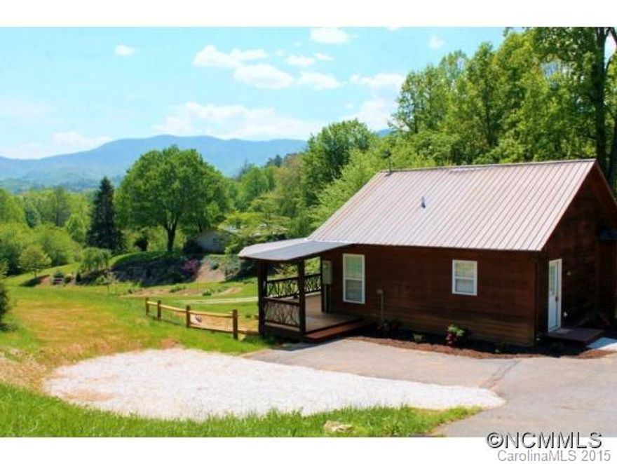 Looking for a view and close to town? Look no further! This 2bdrm/2ba home features a wrap around covered deck that takes in all the view! Each floor has a bdrm&full bath, W&D hook-up and living space! Easy paved access, yet SECONDS to downtown or the high school! Shared city water/private septic. New walls, paint, carpet&tile and french drains! Very unique floor plan with awesome views and location!Don't let this one pass you by!