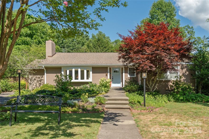 Unbelievable Maple Street location in Brevard, one of America's Coolest Small Towns!  Rare find offering one level living, 3 BRs, 1.5 BAs and overflowing with character and unique elements.  Come be surprised and delighted by the refreshed interior, level, fenced yard, lush gardens and large screened porch plus there’s a modern kitchen, river rock fireplace and vaulted ceilings with skylights.  Cellar for storage plus small outbuilding for the gardener or hobbyist at heart.  Unbeatable in terms of walkability to the library, downtown, dining, parks and so much more.  Pet friendly as well with enclosed rear yard and pet doors.  You'll also enjoy one of the most celebrated Halloween events in the state attracting hundreds to the street on that night.