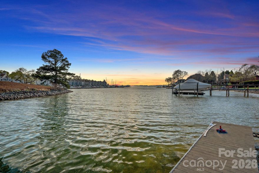 Experience true lakefront living with this rare waterfront opportunity on a .55-acre flat lot with over 110 feet of shoreline, impervious exempt, and no HOA! With its generous shoreline, flat topography, and limitless potential, this is a true Lake Norman gem offering the views, the space, and the lifestyle that make lakefront living so special. Perfectly positioned in a quiet cove off Lake Norman’s main channel, this property offers long-range water views and breathtaking seasonal sunsets that create a peaceful setting. The expansive lot provides both space and privacy, an increasingly rare find, while offering the freedom to build or renovate without restrictions. Whether you choose to enhance the existing home (additional 1,000 ft of unheated basement square footage), or design the custom lakefront retreat you’ve always envisioned, this waterfront property gives you complete flexibility. Surrounded by prestigious multi-million-dollar lake homes, the location blends luxury, tranquility, and natural beauty. The home offers a private dock, ideal for boating, paddleboarding, fishing, or simply relaxing by the water’s edge as the sun sets over the main channel. Conveniently located just minutes from grocery stores, shopping, restaurants, Birkdale Village, parks, walking trails, and major roadways for easy commuting, this property delivers the perfect balance of everyday convenience and elevated lake living. Easily connect to city sewer & city water.