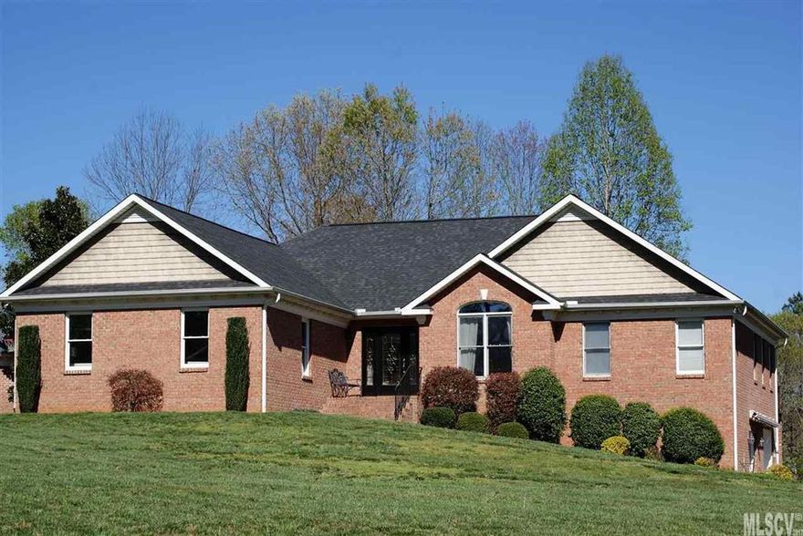 Beautiful Brick Ranch on 1.51 Acres in Gunpowder Point! Enter through the stately leaded glass doors into a foyer featuring cherry & walnut hardwood flooring. Open floor plan w/spacious den and formal dining area w/cathedral ceilings. Gourmet kitchen w/loads of cabinet space, Granite Counter tops, stainless steel appliances w/Double wall ovens. Large breakfast Nook & eat in bar provides plenty of causal dining space. Laundry on main. Large master suite has gorgeous bath w/Travertine & glass tile accents, expansive walk in closet.  Additional bedrooms have baths with unique tile and stone accents and plenty of closet space. Finished basement has large family room, plumbed for wet bar. Bonus room has massive walk in closet and full bath w/Travertine and glass shower. Basement also has workshop and additional storage area. Enjoy the outdoors in the Wonderful in-ground pool. Pool house has kitchenette and full bath. Move in by summer and fall in love w/this Lake Hickory neighborhood!