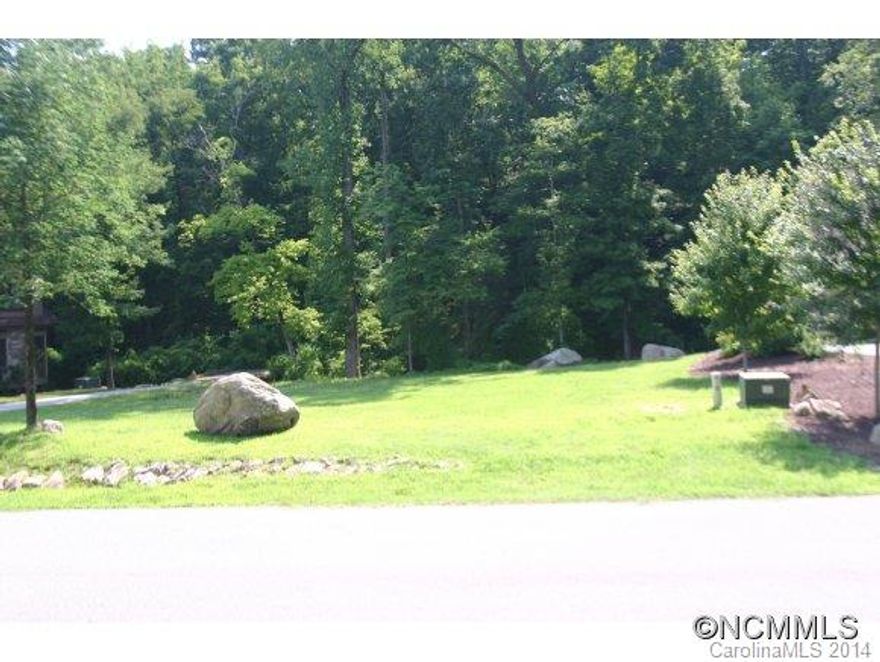 Lot 13 FIREFLY COVEThe only lot available inside the gated Firefly Cove development. Fantastic building lot with bold stream and beautiful mountain views! City water, city sewer and all Firefly amenities, including pool, fitness center, clubhouse and lakeside docks. Priced to sell at $130,000.