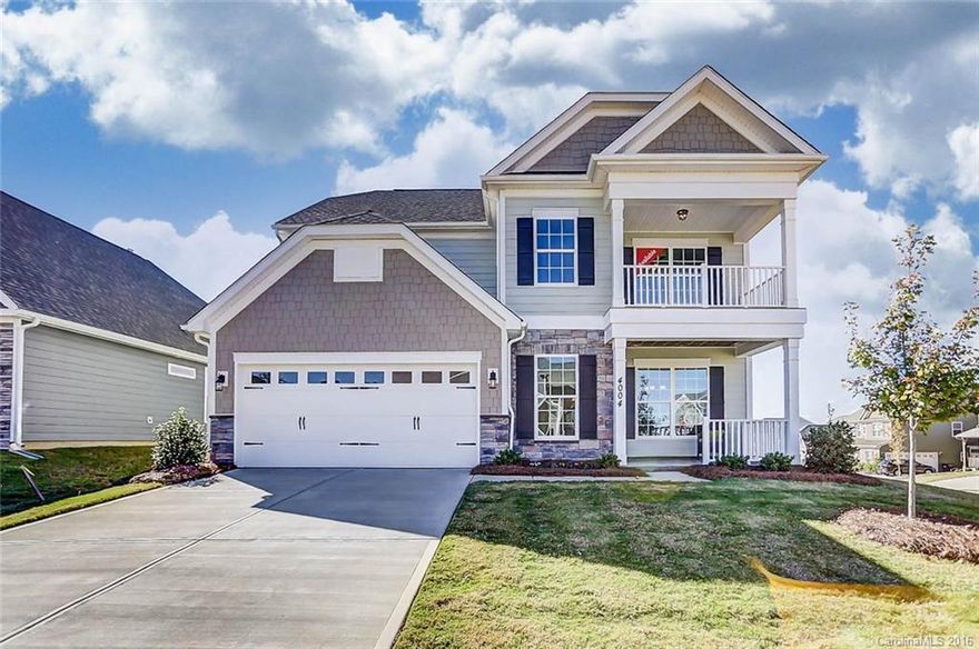 Our most popular plan in a stunning South Carolina community with a covered porch! Upgraded plumbing & light fixtures, crown molding & designer paint & iron rail and pickets add to this beautiful floorplan! Designer Kitchen includes upgraded birch cabinets, granite countertops, hardware, recessed lighting, stainless appliances & glass mosaic backsplash! Don't miss this one - come see this beautiful home today!