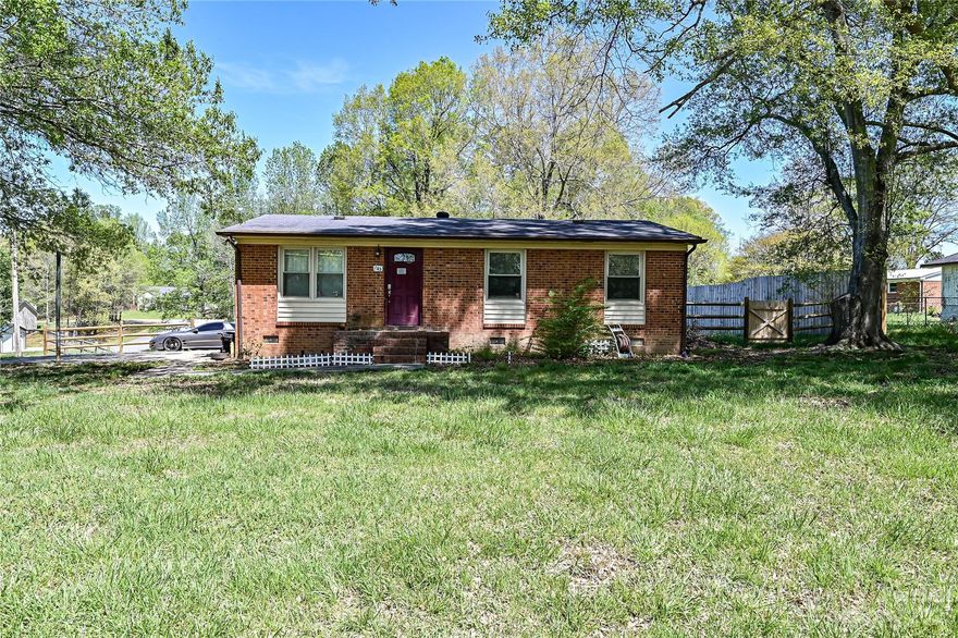 This charming small brick house has a spacious and luxurious primary suite with a huge walk-in closet that will make you feel like royalty.

As you enter the front door, you'll immediately notice the open concept living room and kitchen with updated flooring. Natural light floods the house from both sides of the main living area. 

The primary bedroom is generously sized, with plenty of room for a king-sized bed. The walk-in closet is a dream come true, with ample space to organize all your clothes, shoes and accessories. The closet currently has built in shelving, and could easily be converted back to a 3rd bedroom if desired. 

The second bedroom is also spacious and comfortable, perfect for guests or a home office. The updated bathroom features a sleek, modern design. 

Outside, you'll find a large backyard with plenty of room for outdoor activities and relaxation. The mature trees provide shade and privacy and includes a back deck with over 325sf of space!