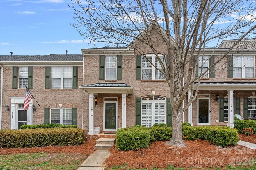 Just steps away from lake access, this freshly painted and move-in ready 3-bedroom, 2.5-bath townhome offers comfort, style, and an unbeatable location. The spacious kitchen features a gas range, stainless steel appliances, bar-top seating, and an open-concept layout, perfect for everyday living and entertaining. The main level welcomes you with a formal entry and a versatile front room ideal for dining or a home office, along with a comfortable living area with a gas fireplace and hardwood flooring throughout.Upstairs features luxury vinyl plank flooring, two secondary bedrooms, hall bathroom,  and a generous primary suite with custom closets and an en-suite bathroom complete with a glass-enclosed shower and garden tub. Enjoy relaxing evenings on the private fenced-in patio with artificial turf and hardscape, plus convenient access to the detached two-car garage.This home is steps from the community boat ramp, floating dock, walking trails, pool, and is ideally located within walking distance to Jetton Park, Village shopping and dining, and The Peninsula Club.