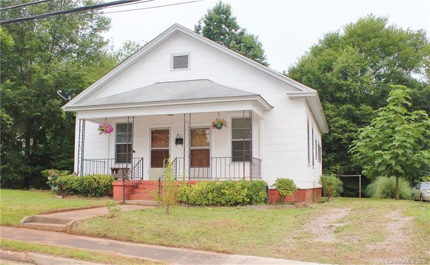 Price Drop! Motivated Seller! Need with closing costs?  Adorable mill home close to Dave Lyle & easy access to Charlotte. Private back yard, that back up to your own woods on half acre. Large eat in kitchen, lots of potential & a separate laundry room. Original hardwood floors. Home has high ceilings, character & charm. Not a duplex. Great starter home, move in ready! Investors-great rental! Buyer/Agent to verify info. necessary i.e., Sq.Ft., zoning, schools, age,lot size, etc.