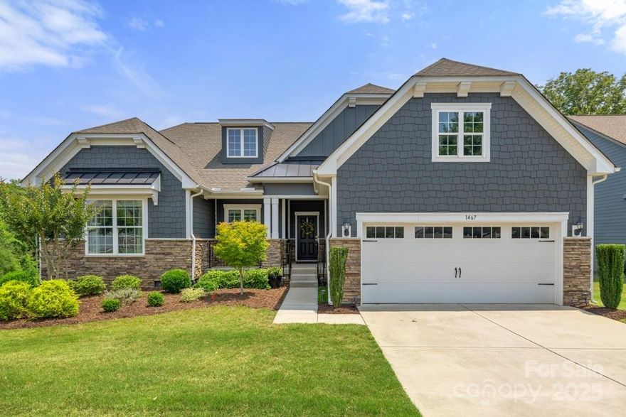 Immaculate Elmont floorplan in active-adult Tree Tops! The open layout features wood floors in the main living areas, kitchen, and primary bedroom with carpeted guest bedrooms, and custom window treatments throughout. The spacious great room has gas-log fireplace. The gourmet kitchen offers white cabinets, SS appliances including double wall oven, gas cooktop, granite counters, tile backsplash, under-cabitnet lighting a large island with bar seating, and recessed lights. Just off of the dining room, the sunroom accesses a large trex deck with a pergola, perfect for morning coffee or evening cocktails and reading. The primary bedroom has an en-suite bath with dual sinks and a walk-in tiled shower with a seat bench. Two guest bedrooms share a full hallway bath—ideal for visitors. Additional features include a laundry room with a utility sink, upgraded light fixtures throughout, newer appliances, epoxy garage flooring, and ample closet storage, and private fenced-in backyard.