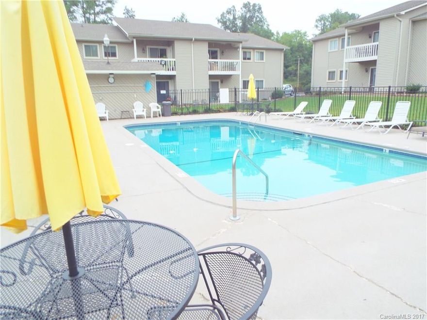 Great location!! Behind Carolina Mall. Close to Hwy 29, I-85. Low condo fees. Gorgeous community Pool. HOA does not allow rentals. Open plan- Kitchen, Dining & Den all together. Vaulted ceiling in den. Fresh paint & newer wood laminate floors. Great size bedrooms & two full baths. No carpet with wood & ceramic tile floors. Walk to Restaurants, Shopping & Movies. Only two floors in building. Balcony patio. All electric for lower utilities. Appliances stay & include refrigerator & washer/dryer.