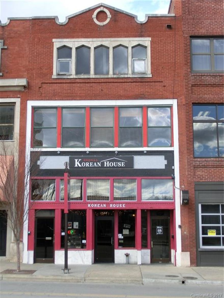 Choice commercial location with existing restaurant and bar plus the potential to develop the upper two floors.  Located in downtown Asheville, across from Pack Square.  Square footage includes three levels plus finished basement.  Main level and basement are leased by restaurant.