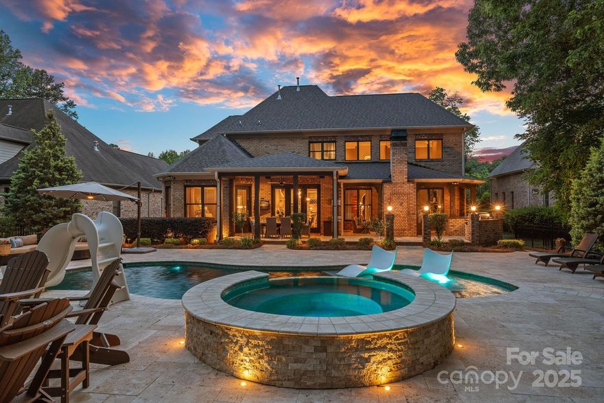STEP INTO YOUR CUSTOM DREAM HOME! Located in the highly desirable Weddington School district, this meticulously maintained luxury home is designed for both comfort & impressive entertaining. The main level features a spacious primary suite & newly renovated spa-like bthrm, chef's kitchen, private office & soaring two-story great room adorned w/ stone fireplace. From the heavy millwork, custom built-ins/cabinetry, new granite countertops & all new carpet/pad, every detail reflects craftsmanship & quality! Outdoor living reaches new heights w/ a resort style heated saltwater pool, XL hot tub, incl waterfalls, deck jets, bubblers & waterslide, surrounded by 3000 sqft of travertine & in/out surround sound. Entertain w/ ease using the outdoor kitchen, 2 covered porches, gas fire pit & outdoor fireplace. Prof landscaping w/ full in-ground irrigation, 3-car garage, new roof & hybrid enclosed crawlspace. A rare opportunity offering luxury, space, and privacy! Ask your agent for upgrades list.