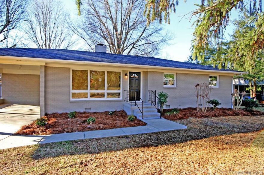 Modern and hip mid-century home fully remodeled - 3 BR 2BA brick ranch on 1/3 acre lot in Mooresville city.  Living room, den with masonry FP, new kitchen with granite, huge laundry/utility room, BIG shop in the back, new deck, fenced yard, new roof, windows, floors, and more.  Great neighborhood for walking with sidewalks, okay to walk to school.