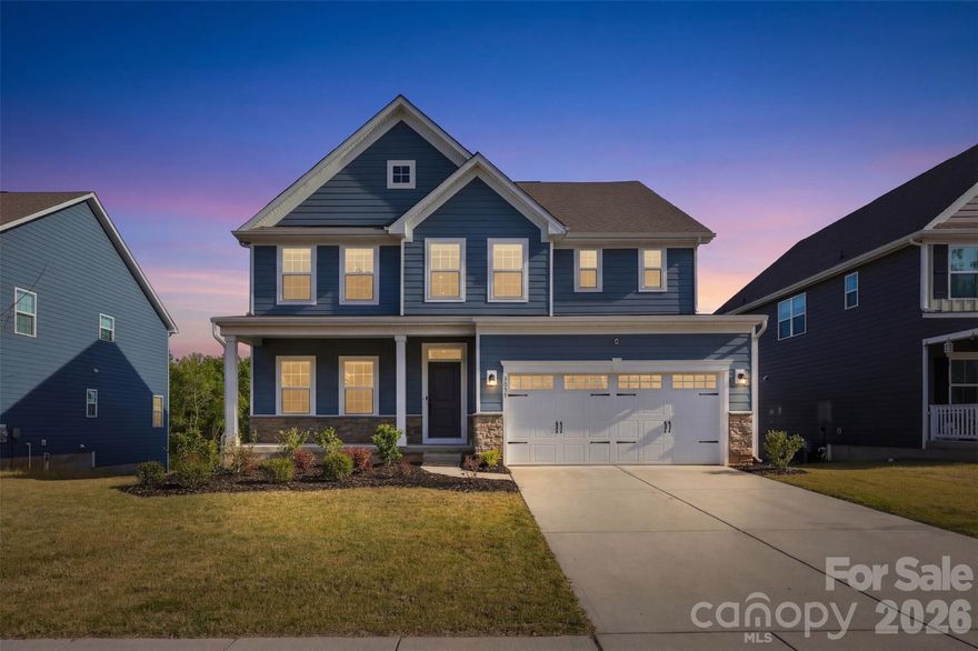 Builder-Finished Basement, Wooded backyard Views & Designer Upgrades—Must See.

Guest bedroom with a full bath makes the home complete. The heart of the home is a chef’s dream kitchen featuring quartz countertops, a massive social island, and soft-close cabinetry and stainless steel appliances. Retreat to a primary suite designed for royalty, boasting dual walk-in closets and a deep soaking tub. Relax in the open loft. Laundry room upstairs and 3 more bedrooms with a full bath.

Step outside to your oversized deck overlooking a lush, flat backyard with serene, private wooded views.

A rare, builder-finished walk-out basement that includes a private bedroom, full bath, and massive dedicated storage space—perfect for a multi-generational suite, home gym, or the ultimate hobbyist retreat.

Enjoy the ultimate convenience with Redstone Cinemas, Costco, Target, Lowe’s, Publix, Walmart and the YMCA all less than 10 minutes from the home. Plus, you are just minutes away from Ballantyne, giving you world-class dining and shopping with the benefit of South Carolina taxes.

Bathed in natural light and loaded with high-end finishes, this home offers the luxury you are looking for.