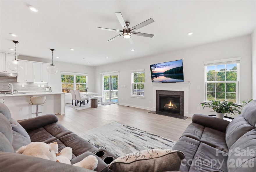 Builder-Finished Basement, Wooded backyard Views & Designer Upgrades—Must See.

Guest bedroom with a full bath makes the home complete. The heart of the home is a chef’s dream kitchen featuring quartz countertops, a massive social island, and soft-close cabinetry and stainless steel appliances. Retreat to a primary suite designed for royalty, boasting dual walk-in closets and a deep soaking tub. Relax in the open loft. Laundry room upstairs and 3 more bedrooms with a full bath.

Step outside to your oversized deck overlooking a lush, flat backyard with serene, private wooded views.

A rare, builder-finished walk-out basement that includes a private bedroom, full bath, and massive dedicated storage space—perfect for a multi-generational suite, home gym, or the ultimate hobbyist retreat.

Enjoy the ultimate convenience with Redstone Cinemas, Costco, Target, Lowe’s, Publix, Walmart and the YMCA all less than 10 minutes from the home. Plus, you are just minutes away from Ballantyne, giving you world-class dining and shopping with the benefit of South Carolina taxes.

Bathed in natural light and loaded with high-end finishes, this home offers the luxury you are looking for.