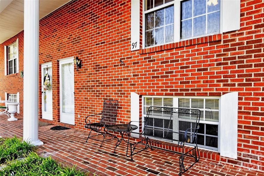 Enjoy the best of mountain living with the convenience of city access at Laurelwood Townhouses. Ideally located just outside the city limits, this home is only minutes from Lake James, downtown Marion, Interstate 40, and more.

The upper level features two spacious bedrooms with a shared bath, while the main level offers a comfortable living area, dining space, kitchen, pocket bath, laundry, and ample storage. The dining area opens to a private patio with terraced gardens and a deck overlooking the woods, offering filtered mountain views—perfect for relaxing or entertaining. Additional designated storage areas provide extra convenience.

This townhome includes access to community amenities such as a pool and trash service, along with paved parking for easy, year-round access—no steep or gravel roads. 

Bright, light-filled rooms throughout make this home feel warm and inviting. Don’t miss this affordable opportunity to enjoy mountain living in Western North Carolina, with Asheville, Hickory, and Old Fort all just a short drive away. (This property is being offered in as-is, where-is condition.