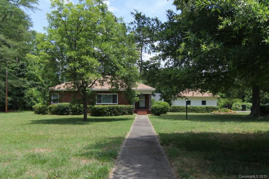 Adorable Ranch that has been updated and all ready to MOVE IN! New Gas HVAC, Tankless Hot Water Heater, Windows (2013) Knotty Pine Wall, Hardwood flooring, and built in bookshelves gives this home some character. Wood burning fireplace. Master has double closets with pocket doors. Bathroom has been renovated with new shower surround, flooring, vanity and hardware. Deep Linen Closet. Kitchen has a sunny breakfast area w/ beadboard paneling and custom cabinets. Refrigerator, Washer & Dryer Stays.