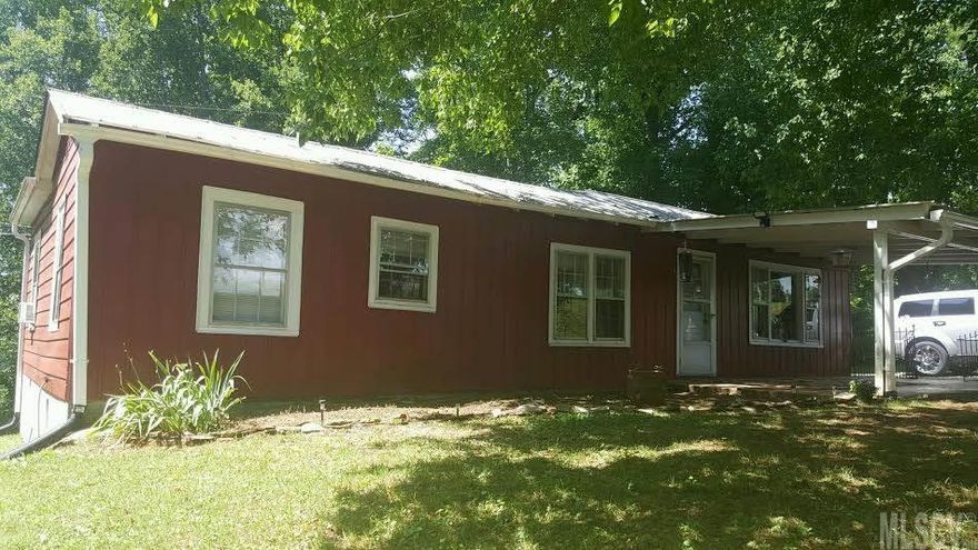 This 2 bedroom 1 bath private home sits on a 1.2 acre lot. Located right outside the city limits on a paved road. Recently updated with fresh paint, new bath, recessed lighting, new well pump, new water heater, new flooring, new electrical throughout the home and also a fence around the yard. Home also includes Black Stainless Refrigerator and Oven. Crawlspace/basement for storage! Home also carries a transferable termite bond with Right Way Pest Control.