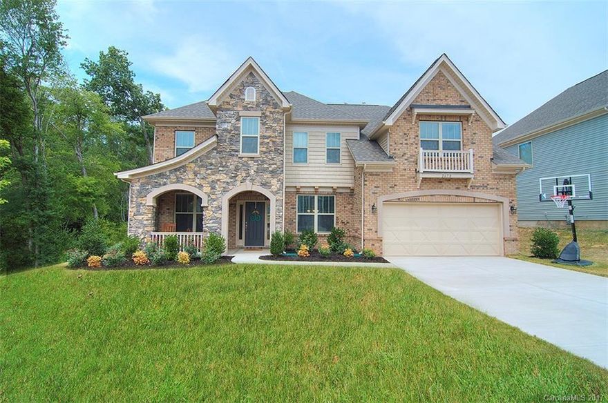 Gorgeous home on cul-de-sac lot! Stone exterior w/covered porch. Inside you will find hardwoods throughout foyer, formal dining, study, great room, kitchen & breakfast area! Beautiful gourmet kitchen complete w/granite countertops, stainless steel appliances, wall oven, large island and white cabinets! Guest bedroom on main floor. Upstairs there is a huge loft perfect for play area or media room! Master bedroom has his/her closets. Large secondary bedrooms! Custom paint throughout entire home!